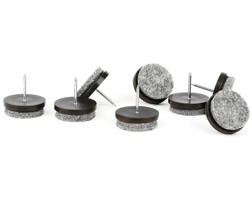 Několik nábytkových kluzáků s hřebíkem a plstěnou kluznou plochou