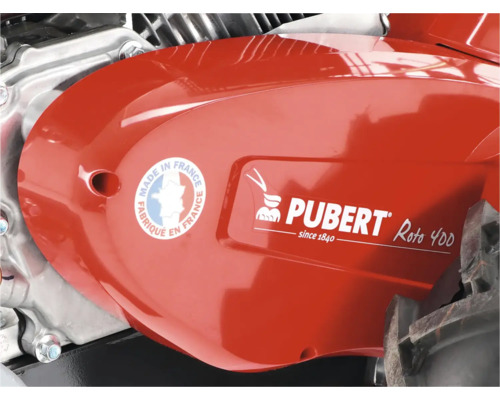 Detailní pohled na kryt motoru s logem Pubert a pečetí původu