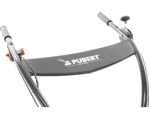 Detailní pohled na ovládací prvky motorového zařízení s logem Pubert