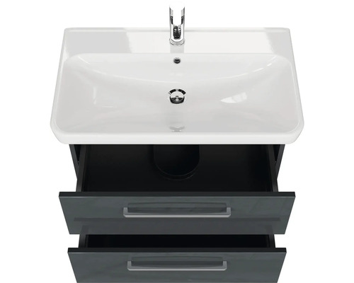 Umyvadlo se dvěma zásuvkami a baterií