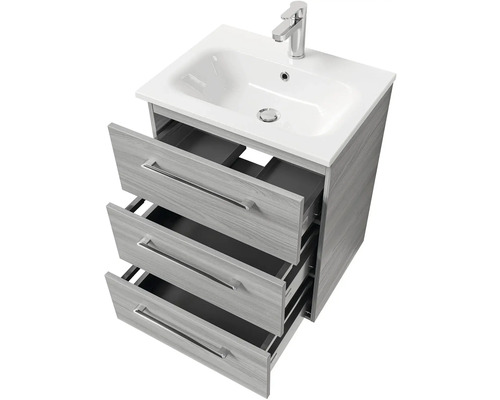 Skříňka pod umyvadlo se třemi otevřenými zásuvkami a baterií