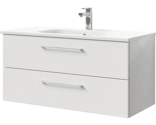 Bílá skříňka pod umyvadlo se dvěma zásuvkami a umyvadlem na desku