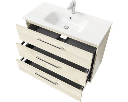 Skříňka pod umyvadlo se třemi otevřenými zásuvkami a umyvadlem