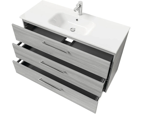 Skříňka pod umyvadlo se třemi otevřenými zásuvkami, umyvadlem a baterií