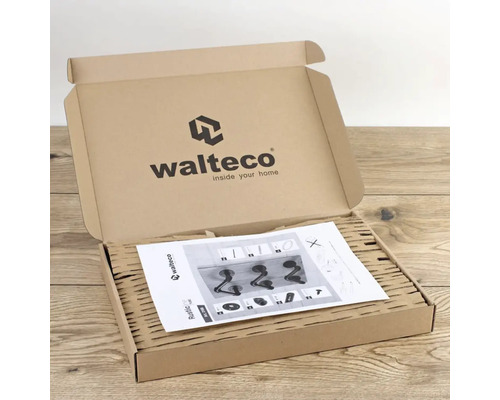 Otevřená kartonová krabice s montážním návodem na nástěnný věšák od společnosti Walteco