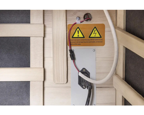 Detail elektrických přípojek a varování sauny.