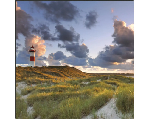 Krajinná fotografie s majákem a dunami