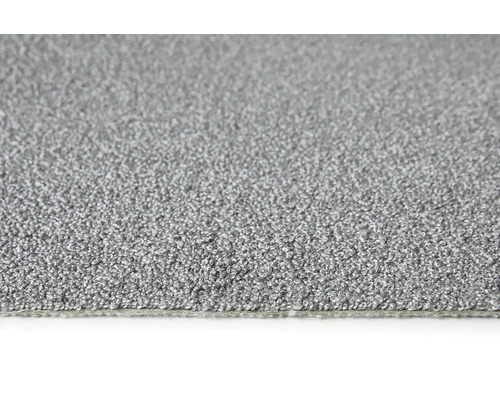 Detail šedého koberce