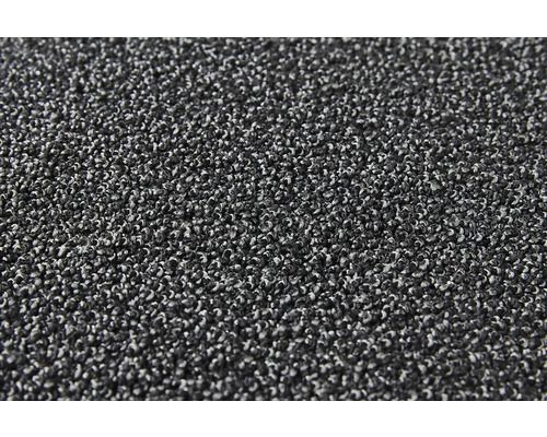 Detail šedého koberce se smyčkovou strukturou