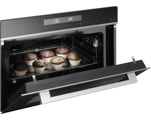 Vestavná trouba s muffiny na plechu na pečení