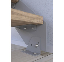 Detail uchycení schodiště šrouby ke zdi a podlaze