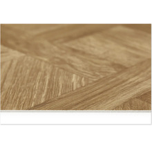 Detail laminátové podlahy se vzorem rybí kosti