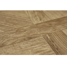 Detail laminátové podlahy se vzorem rybí kosti