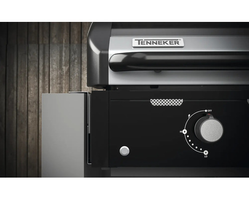 Detailní pohled na plynový gril Tenneker s ovládacím panelem a regulátorem teploty