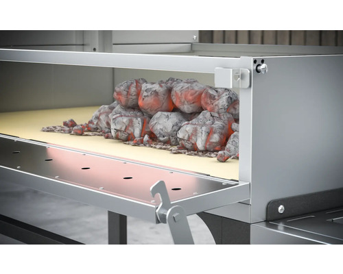 Gril s dřevěným uhlím v zapalovacím komínu