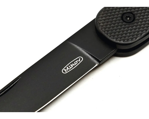 Detail černého nože Mikov.
