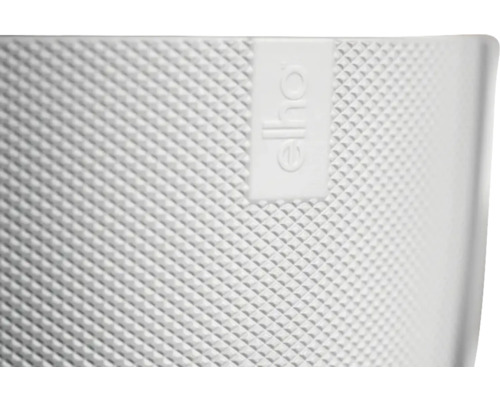 Detailní pohled na květináč s logem Elho a kosočtvercovým vzorem