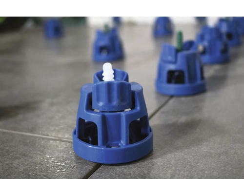 Nivelační systém dlaždic pro podporu při pokládce dlaždic