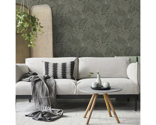 Obývací pokoj s pohovkou, polštářem, dekou a stolem