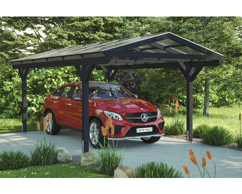 Přístřešek na auto SKAN HOLZ Westerwald vč. kotev pro sloupky, 362 x 648 cm antracit Dřevěný přístřešek pro auto s autem pod ním na příjezdové cestě.