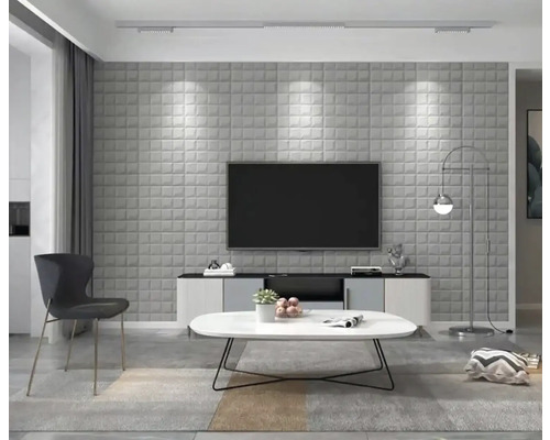 Obývací pokoj se šedým 3D stěnovým panelem, televizí, stolem a židlí