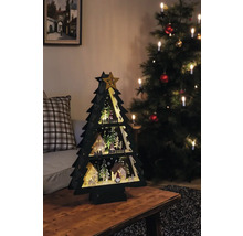 Dekorativní dřevěný vánoční stromek s osvětlením na stole