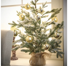 Zdobený miniaturní vánoční stromek s koulemi