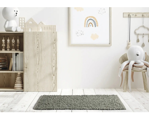 Dekorativní dětský pokoj s regálem, sedacím nábytkem a kobercem