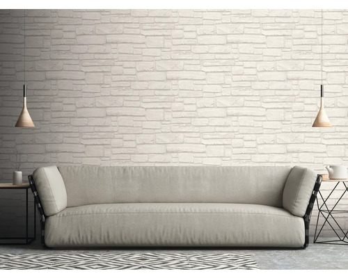 Obývací pokoj s pohovkou a nástěnnou tapetou se vzhledem kamene