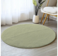 Kulaty koberec z mekkého materiálu na drevené podlaze