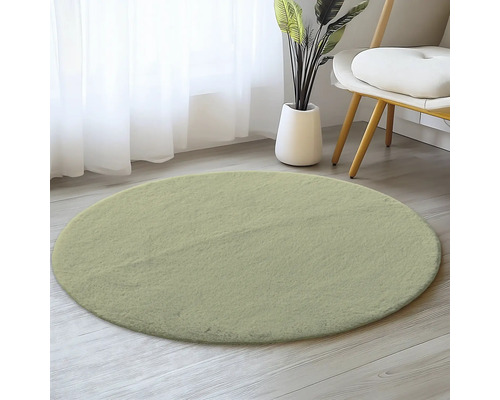Kulaty koberec z mekkého materiálu na drevené podlaze