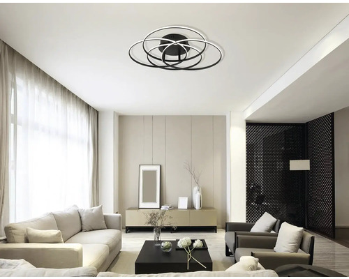 Obývací pokoj s moderním designem a kruhovým stropním svítidlem