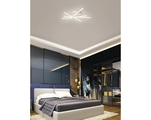 Moderní ložnice se stropním svítidlem