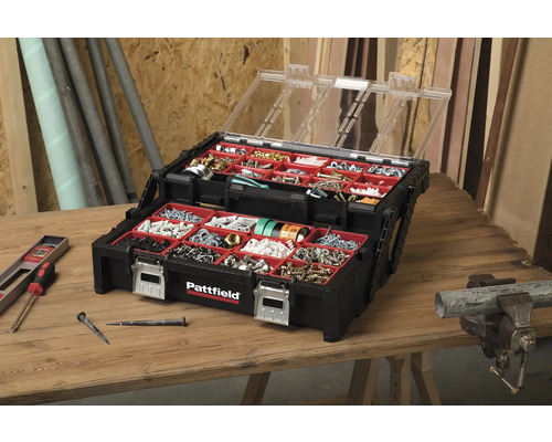 Otevřený kufřík Pattfield na šrouby a hřebíky na dřevěném stole