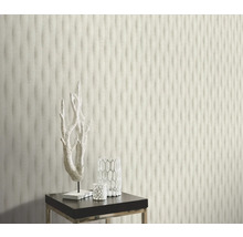 Dekorativní nástěnná úprava s 3D nástěnným panelem ve vlnitém designu.