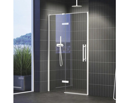 Koupelna se sprchovým koutem s otočnými dveřmi a šedými obklady