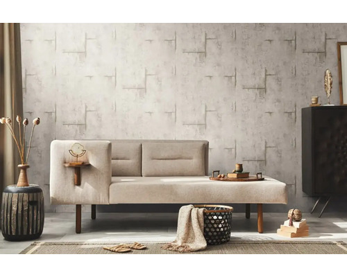 Obývací pokoj s pohovkou, odkládacím stolkem a dekorativními prvky