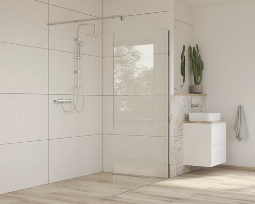 Moderní koupelna se sprchovým koutem, sprchovou baterií a umyvadlem