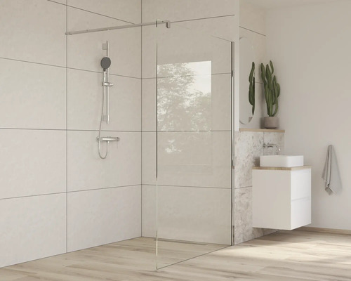 Koupelna se sprchovým koutem, umyvadlem a baterií