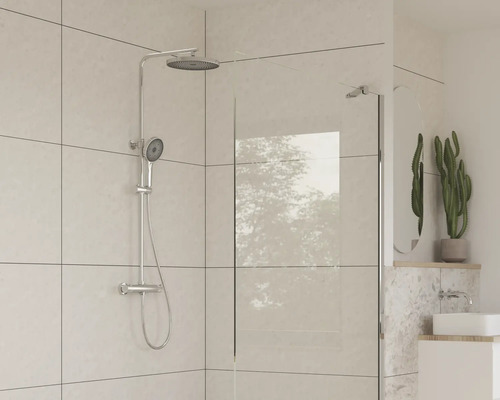 Sprchová souprava se sprchovou zástěnou a umyvadlem v koupelně