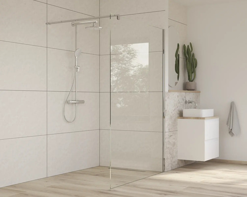 Sprchový kout se sprchovou armaturou a umyvadlem v moderní koupelně