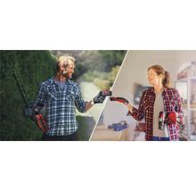 Muž se nůžkami na živý plot a žena s vrtačkou si vyměňují baterii.