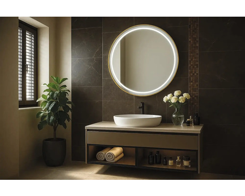 Moderní koupelna s kulatým zrcadlem, umyvadlem a rostlinou