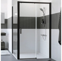 Sprchový kout s černým rámem a skleněnou stěnou v koupelně