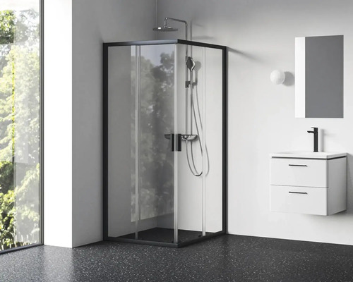 Moderní koupelna se sprchovým koutem, umyvadlem a zrcadlem