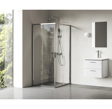 Rohová sprcha se sprchovou baterií a umyvadlo se zrcadlem v koupelně