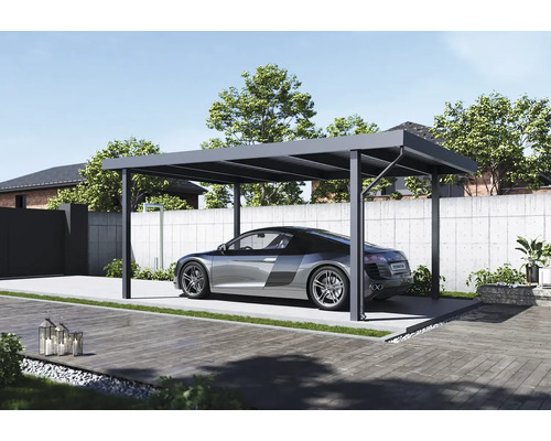 Moderní carport s autem na pozemku.