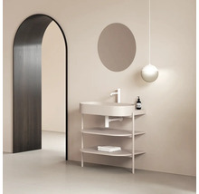 Moderní koupelna s umyvadlovou skříňkou, kulatým zrcadlem a závěsným světlem