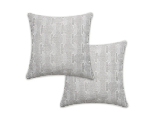 Dva dekorativní polštáře s geometrickým vzorem do obývacího pokoje.