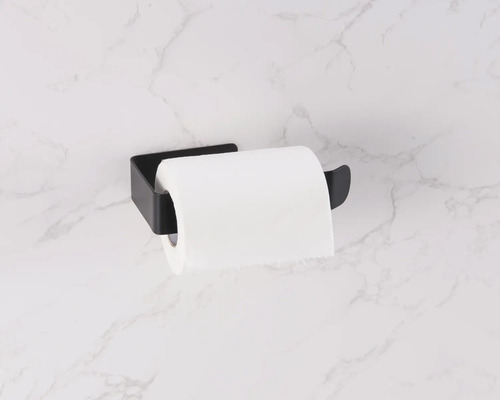 Držák toaletního papíru z kovu s rolí papíru
